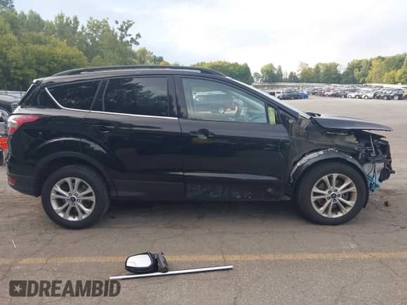2018 Ford Escape SE с VIN 1FMCU9GD7JUA58093, выставлен на аукционе IAAI как лот 43185112 с пробегом 112 038 миль миль и . История ставок и продаж доступна на DreamBid. Изображение 14.
