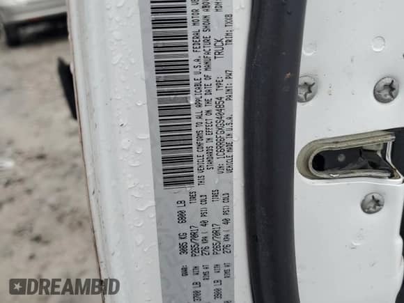 2016 Ram 1500 Tradesman z VIN 1C6RR6FGXGS404854, wystawiony jako Copart lot #65188755 z przebiegiem 154 910 mil mil oraz Szkoda całkowita • Salvage title. Historia ofert i sprzedaży dostępna na DreamBid. Obrazek 12.