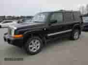2007 Jeep Commander Overland with VIN 1J8HG68247C557731, listed as a Copart auction lot 87964795 with 174,195 mi miles and Salvage title. Bid and sale history available at DreamBid. Image 1.