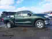 2011 Toyota Tundra с VIN 5TFUY5F10BX165953, выставлен на аукционе IAAI как лот 41533552 с пробегом 300 586 миль миль и . История ставок и продаж доступна на DreamBid. Изображение 12.