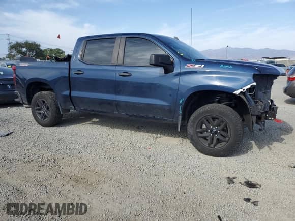 2021 Chevrolet Silverado 1500 Custom Trail Boss with VIN 1GCPYCEH3MZ440190, listed as a Copart auction lot 58587105 with 93,033 mi miles and Salvage title. Bid and sale history available at DreamBid. Image 4.