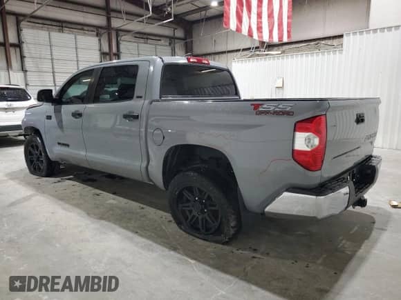 2020 Toyota Tundra SR5 with VIN 5TFEY5F14LX261476, listed as a Copart auction lot 70022205 with 180,181 mi miles and Salvage title. Bid and sale history available at DreamBid. Image 2.