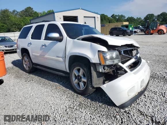 2008 Chevrolet Tahoe 1LT with VIN 1GNFC13018R191168, listed as a Copart auction lot 56855825 with 203,059 mi miles and Salvage title. Bid and sale history available at DreamBid. Image 4.