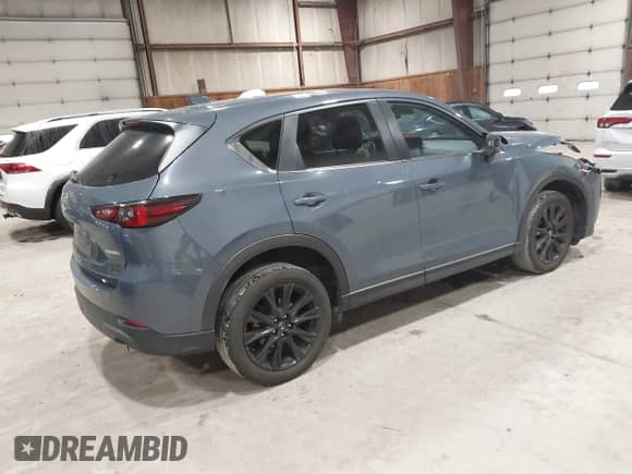 2022 Mazda CX-5 S Preferred z VIN JM3KFBCM1N0551165, wystawiony jako IAAI lot #42277023 z przebiegiem 34 115 mil mil oraz . Historia ofert i sprzedaży dostępna na DreamBid. Obrazek 4.