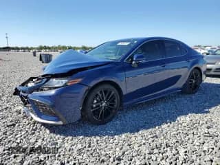 2024 Toyota Camry Hybrid XSE with VIN 4T1K31AK5RU071962, listed as a Copart auction lot 82486155 with 21,135 mi miles and Non repairable. Bid and sale history available at DreamBid. Image 1.