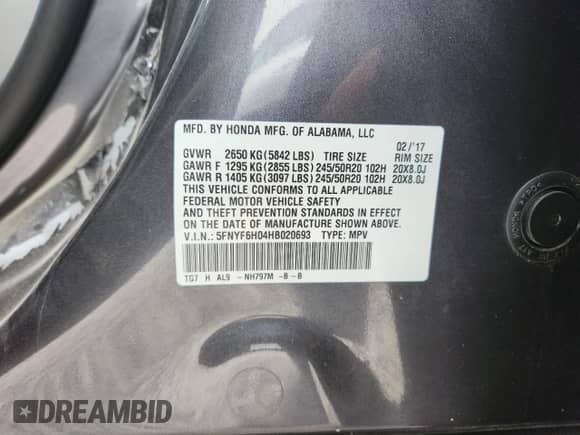 2017 Honda Pilot Elite z VIN 5FNYF6H04HB020693, wystawiony jako Copart lot #81411135 z przebiegiem Nie podano mil oraz Szkoda całkowita • Salvage title. Historia ofert i sprzedaży dostępna na DreamBid. Obrazek 12.