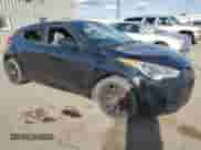 2013 Hyundai Veloster w/Black Int z VIN KMHTC6AD8DU147119, wystawiony jako Copart lot #82261415 z przebiegiem 132 516 mil mil oraz Szkoda całkowita • Salvage title. Historia ofert i sprzedaży dostępna na DreamBid. Obrazek 4.