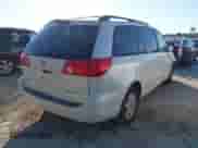 2009 Toyota Sienna XLE with VIN 5TDZK22CX9S232491, listed as a IAAI auction lot 43389674 with 298,733 mi miles and . Bid and sale history available at DreamBid. Image 4.