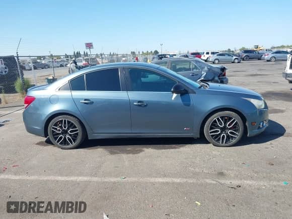 2012 Chevrolet Cruze LTZ with VIN 1G1PH5SC3C7327072, listed as a IAAI auction lot 43236216 with 184,800 mi miles and . Bid and sale history available at DreamBid. Image 13.