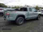 2022 Toyota Tacoma SR z VIN 3TYSZ5AN6NT076787, wystawiony jako Copart lot #86312735 z przebiegiem 22 446 mil mil oraz Szkoda całkowita • Salvage title. Historia ofert i sprzedaży dostępna na DreamBid. Obrazek 3.
