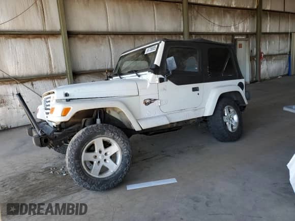 1997 Jeep Wrangler Sahara with VIN 1J4FY49S6VP523577, listed as a Copart auction lot 66736805 with 194,481 mi miles and Salvage title. Bid and sale history available at DreamBid. Image 1.