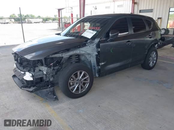2023 Mazda CX-5 S Carbon Edition z VIN JM3KFBCM8P0251108, wystawiony jako IAAI lot #42171155 z przebiegiem 45 551 mil mil oraz . Historia ofert i sprzedaży dostępna na DreamBid. Obrazek 2.