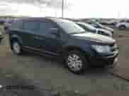 2015 Dodge Journey American Value with VIN 3C4PDCAB1FT606021, listed as a Copart auction lot 82532625 with 93,957 mi miles and Clean title. Bid and sale history available at DreamBid. Image 4.