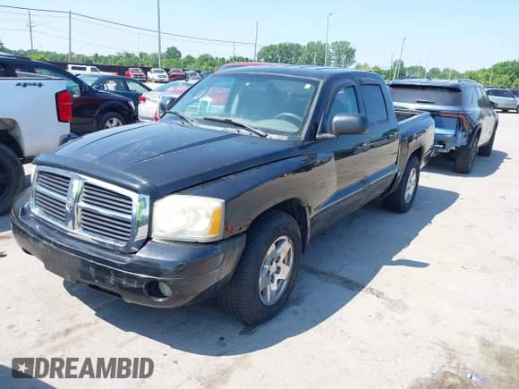 2005 Dodge Dakota SLT with VIN 1D7HW48N05S119919, listed as a IAAI auction lot 42605894 with 181,701 mi miles and . Bid and sale history available at DreamBid. Image 2.
