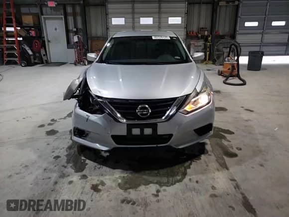2016 Nissan Altima S with VIN 1N4AL3AP2GC219548, listed as a Copart auction lot 62339135 with 143,414 mi miles and Salvage title. Bid and sale history available at DreamBid. Image 13.