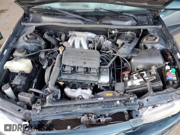 1997 Toyota Camry LE z VIN JT2BF22K6V0019668, wystawiony jako Copart lot #49573075 z przebiegiem 243 778 mil mil oraz Szkoda całkowita • Salvage title. Historia ofert i sprzedaży dostępna na DreamBid. Obrazek 11.