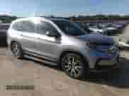 2021 Honda Pilot Touring 7-Passenger with VIN 5FNYF5H69MB000710, listed as a IAAI auction lot 43081838 with 91,899 mi miles and . Bid and sale history available at DreamBid. Image 1.