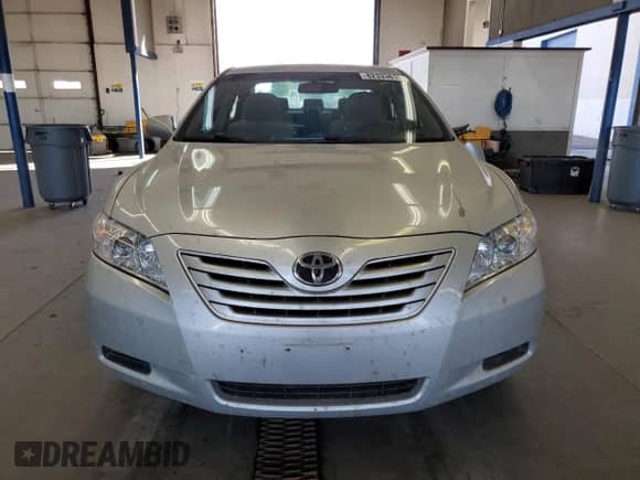 2007 Toyota Camry CE z VIN 4T1BE46K57U541165, wystawiony jako Copart lot #82333615 z przebiegiem 148 405 mil mil oraz Szkoda całkowita • Salvage title. Historia ofert i sprzedaży dostępna na DreamBid. Obrazek 5.