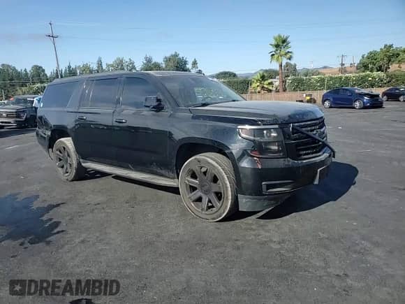 2018 Chevrolet Suburban LT с VIN 1GNSCHKC4JR210160, выставлен на аукционе Copart как лот 71520695 с пробегом 56 803 миль миль и Списание • Salvage title. История ставок и продаж доступна на DreamBid. Изображение 14.
