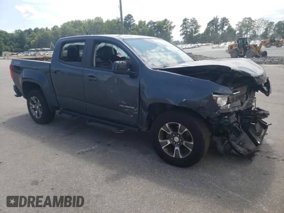 2020 Chevrolet Colorado 4WD Z71 with VIN 1GCGTDEN1L1161201, listed as a Copart auction lot 58840584 with 60,456 mi miles and Salvage title. Bid and sale history available at DreamBid. Image 4.
