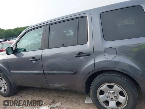 2015 Honda Pilot LX with VIN 5FNYF4H24FB013455, listed as a IAAI auction lot 42409520 with 152,718 mi miles and . Bid and sale history available at DreamBid. Image 14.