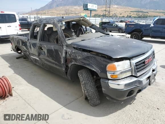 2005 GMC Sierra 1500 SLE с VIN 1GTEK19Z25Z210691, выставлен на аукционе Copart как лот 66387295 с пробегом Не указан миль и Списание • Salvage title. История ставок и продаж доступна на DreamBid. Изображение 4.