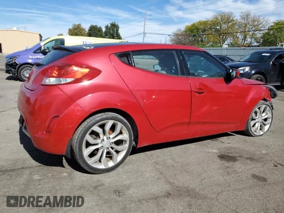 2012 Hyundai Veloster w/Black Int z VIN KMHTC6AD8CU076244, wystawiony jako Copart lot #82572615 z przebiegiem 180 435 mil mil oraz Czysty tytuł • Clean title. Historia ofert i sprzedaży dostępna na DreamBid. Obrazek 3.