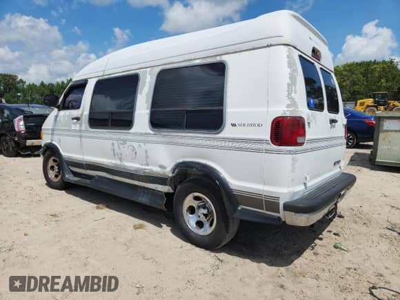2003 Dodge RAM with VIN 2D6WB11Y13K507940, listed as a Copart auction lot 66202915 with 144,183 mi miles and Salvage title. Bid and sale history available at DreamBid. Image 2.