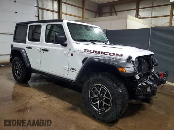 2024 Jeep Wrangler Rubicon with VIN 1C4PJXFG3RW300831, listed as a Copart auction lot 82029925 with 29,328 mi miles and Clean title. Bid and sale history available at DreamBid. Image 4.