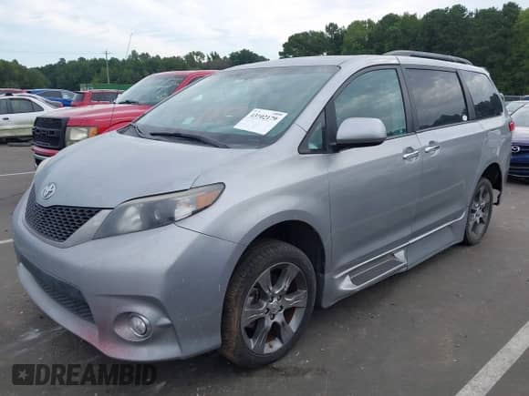 2014 Toyota Sienna SE with VIN 5TDXK3DC6ES421515, listed as a IAAI auction lot 43102179 with 63,756 mi miles and . Bid and sale history available at DreamBid. Image 6.