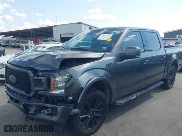 2020 Ford F-150 Lariat z VIN 1FTEW1E52LFA13901, wystawiony jako IAAI lot #42933180 z przebiegiem 93 944 mil mil oraz . Historia ofert i sprzedaży dostępna na DreamBid. Obrazek 20.