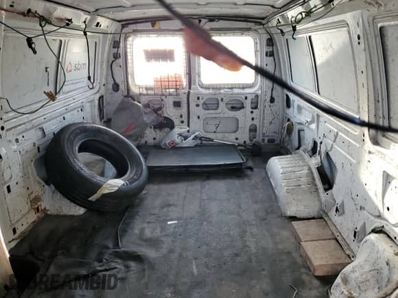 2001 Ford Econoline Cargo с VIN 1FTRE142X1HA65337, выставлен на аукционе Copart как лот 64150804 с пробегом 219 274 миль миль и На запчасти • Non repairable. История ставок и продаж доступна на DreamBid. Изображение 10.