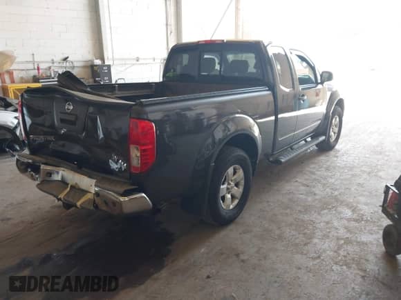 2013 Nissan Frontier SV with VIN 1N6AD0CW3DN713859, listed as a IAAI auction lot 42562240 with 127,403 mi miles and . Bid and sale history available at DreamBid. Image 4.