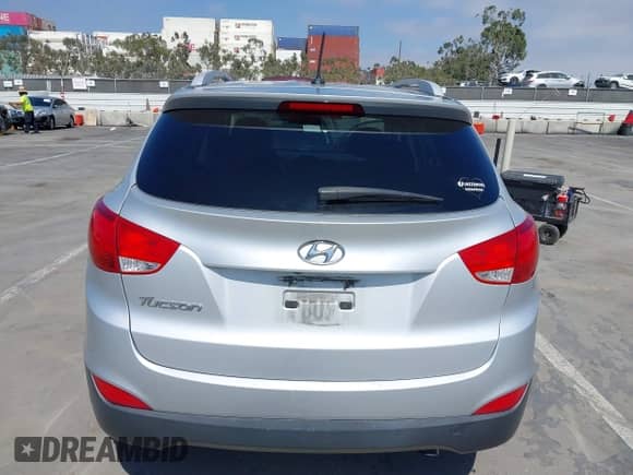 2014 Hyundai Tucson Limited with VIN KM8JU3AG1EU908507, listed as a IAAI auction lot 42722911 with 148,428 mi miles and . Bid and sale history available at DreamBid. Image 16.