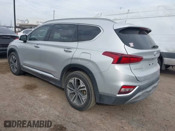 2019 Hyundai Santa Fe Limited with VIN 5NMS53AA4KH061342, listed as a IAAI auction lot 41573631 with 98,498 mi miles and . Bid and sale history available at DreamBid. Image 3.