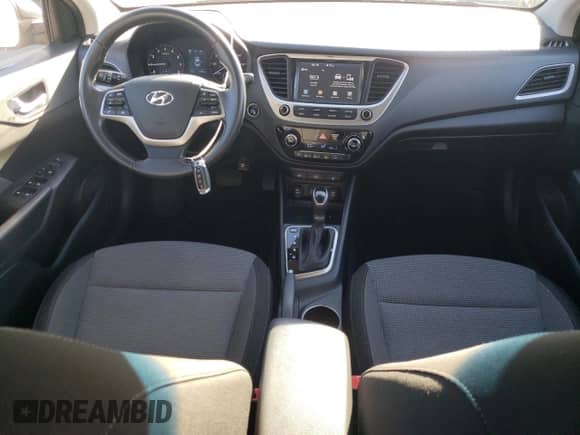 2018 Hyundai Accent Limited с VIN 3KPC34A33JE031594, выставлен на аукционе Copart как лот 87111345 с пробегом 63 454 миль миль и Списание • Salvage title. История ставок и продаж доступна на DreamBid. Изображение 8.