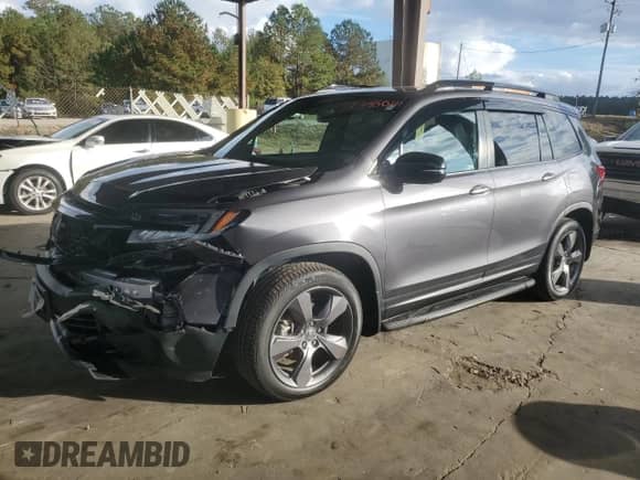 2021 Honda Passport Touring с VIN 5FNYF7H97MB012926, выставлен на аукционе Copart как лот 79346014 с пробегом 59 096 миль миль и Списание • Salvage title. История ставок и продаж доступна на DreamBid. Изображение 1.