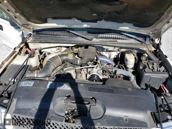 2003 Chevrolet Silverado 2500HD LS с VIN 1GCHK23183F166541, выставлен на аукционе Copart как лот 75741704 с пробегом 322 826 миль миль и Списание • Salvage title. История ставок и продаж доступна на DreamBid. Изображение 11.