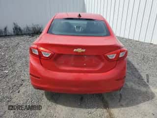 2017 Chevrolet Cruze LS z VIN 1G1BC5SM6H7178438, wystawiony jako Copart lot #69751385 z przebiegiem 88 091 mil mil oraz Czysty tytuł • Clean title. Historia ofert i sprzedaży dostępna na DreamBid. Obrazek 6.