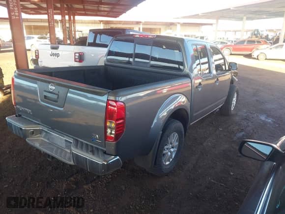 2017 Nissan Frontier SV with VIN 1N6DD0ER2HN766126, listed as a IAAI auction lot 43453656 with 89,902 mi miles and . Bid and sale history available at DreamBid. Image 4.