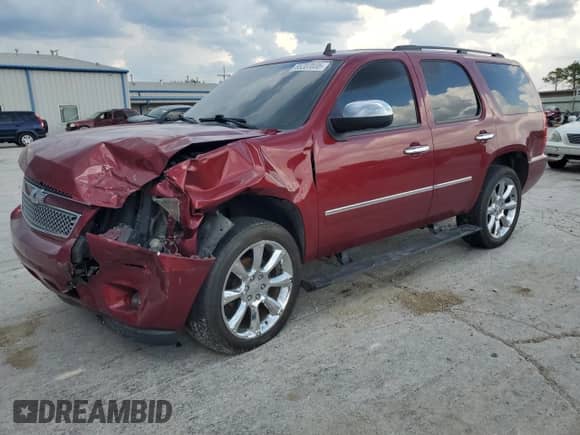 2011 Chevrolet Tahoe LTZ with VIN 1GNSKCE00BR315500, listed as a Copart auction lot 65207035 with 137,422 mi miles and Salvage title. Bid and sale history available at DreamBid. Image 1.
