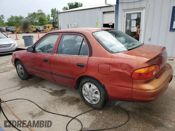 2002 Chevrolet Prizm with VIN 1Y1SK52892Z424662, listed as a Copart auction lot 60878335 with 116,255 mi miles and Salvage title. Bid and sale history available at DreamBid. Image 2.