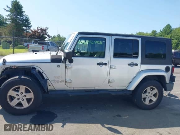 2008 Jeep Wrangler Unlimited Sahara с VIN 1J4GA59118L623149, выставлен на аукционе IAAI как лот 42956542 с пробегом 208 616 миль миль и . История ставок и продаж доступна на DreamBid. Изображение 15.