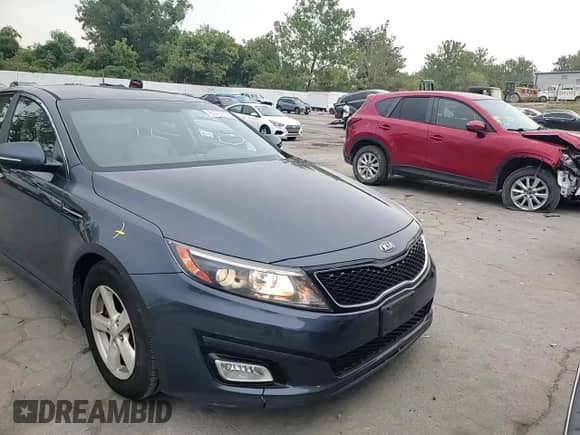 2015 Kia Optima LX with VIN KNAGM4A71F5562360, listed as a Copart auction lot 81652095 with 105,069 mi miles and Salvage title. Bid and sale history available at DreamBid. Image 13.
