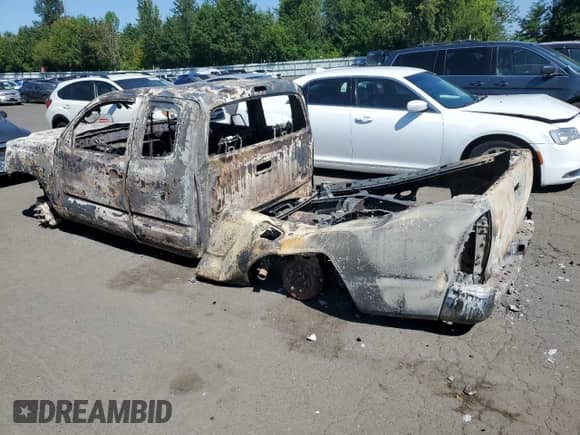 2014 Toyota Tacoma с VIN 5TFUU4EN4EX085067, выставлен на аукционе Copart как лот 62264825 с пробегом Не указан миль и Списание • Salvage title. История ставок и продаж доступна на DreamBid. Изображение 2.