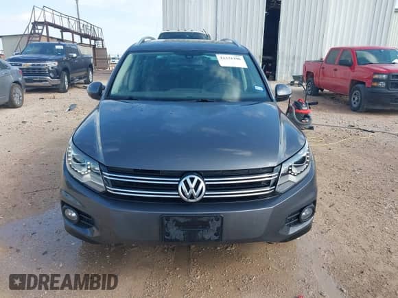 2016 Volkswagen Tiguan S z VIN WVGAV7AX4GW574940, wystawiony jako IAAI lot #42331396 z przebiegiem 81 711 mil mil oraz . Historia ofert i sprzedaży dostępna na DreamBid. Obrazek 12.