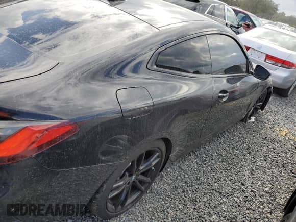 2022 BMW 4 Series M440i xDrive с VIN WBA13AR00NCH99689, выставлен на аукционе Copart как лот 73887294 с пробегом Не указан миль и На запчасти • Non repairable. История ставок и продаж доступна на DreamBid. Изображение 3.