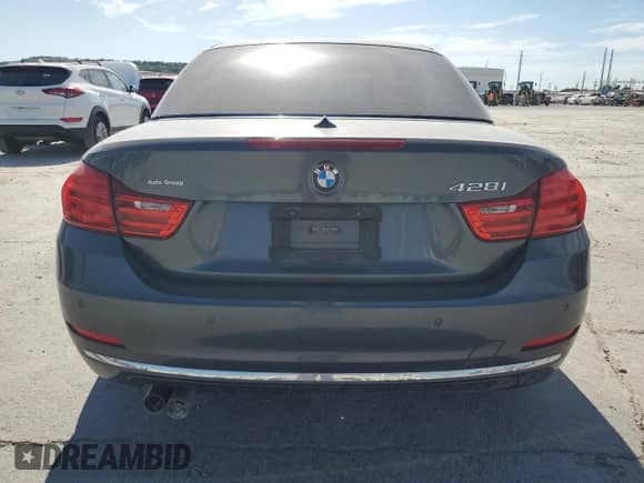2015 BMW 4 Series 428i with VIN WBA3V7C54FP771900, listed as a Copart auction lot 66550815 with 104,367 mi miles and Salvage title. Bid and sale history available at DreamBid. Image 6.