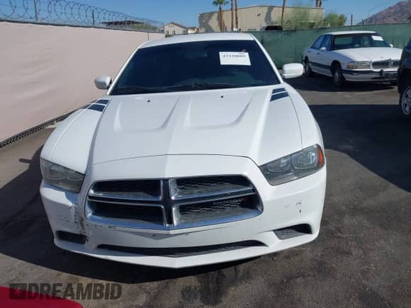 2014 Dodge Charger SE z VIN 2C3CDXBG8EH186625, wystawiony jako IAAI lot #43220089 z przebiegiem 168 978 mil mil oraz . Historia ofert i sprzedaży dostępna na DreamBid. Obrazek 6.