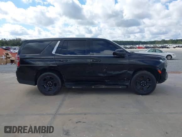 2021 Chevrolet Tahoe Commercial with VIN 1GNSCLED3MR307524, listed as a IAAI auction lot 43220890 with 58,961 mi miles and . Bid and sale history available at DreamBid. Image 13.